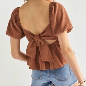 Francesca’s brown corduroy peplum tie back top
